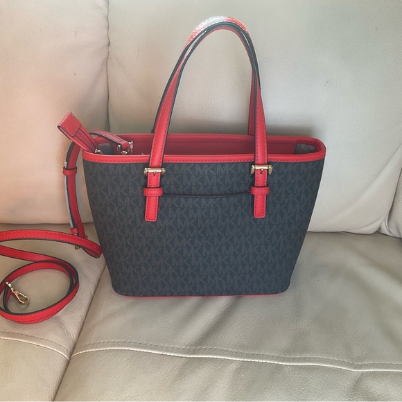 This is the Michael Kors Jet Set Travel Extra-Small Logo Top-Zip Tote Bag. - Picture 4 of 4